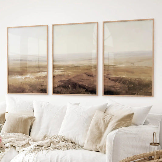 Vintage abstract landscape beige and brown set of 3 prints. Thinwood frames over the couch.