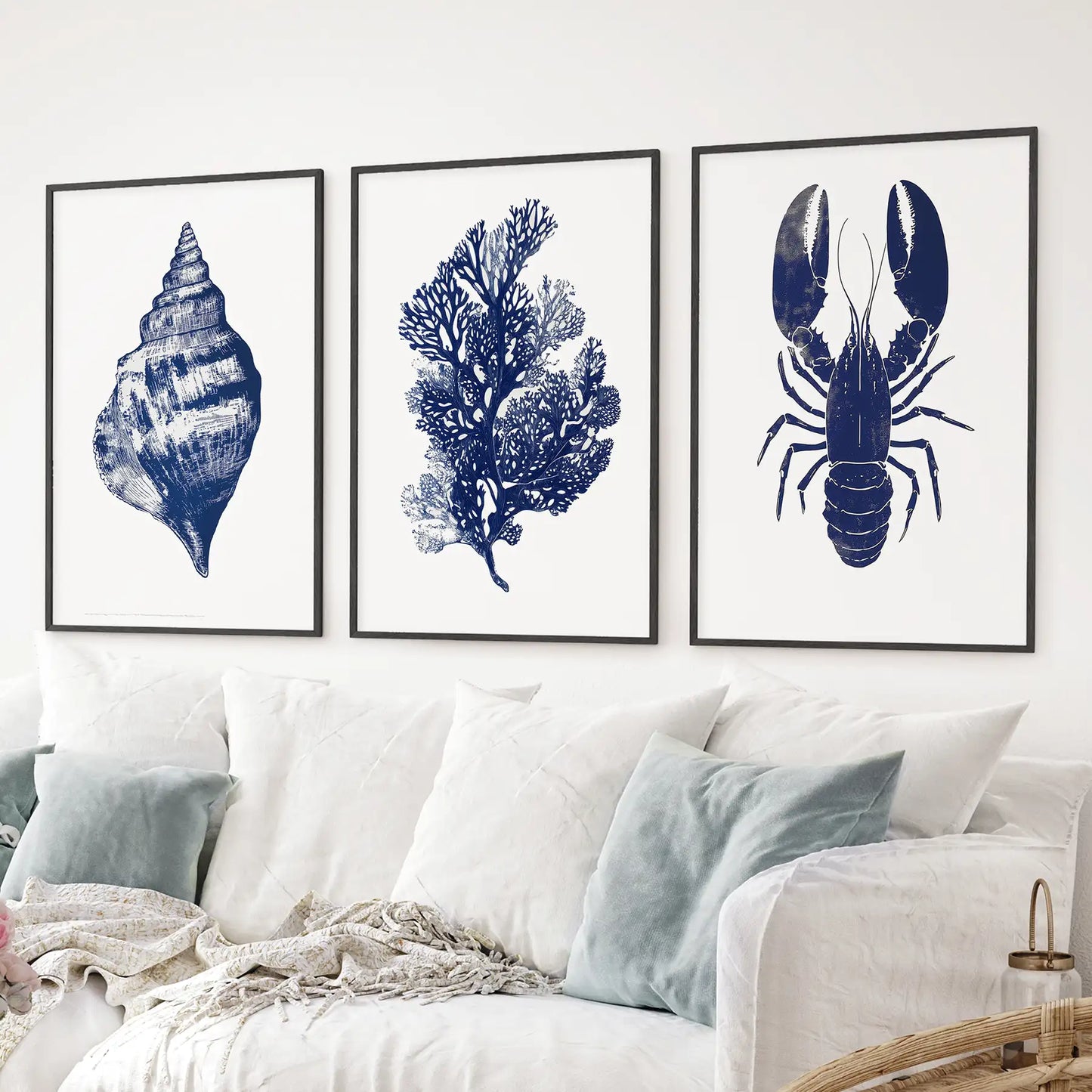 Coastal nautical wall art home decor. Beach house artwork large prints. Black frames over the couch.