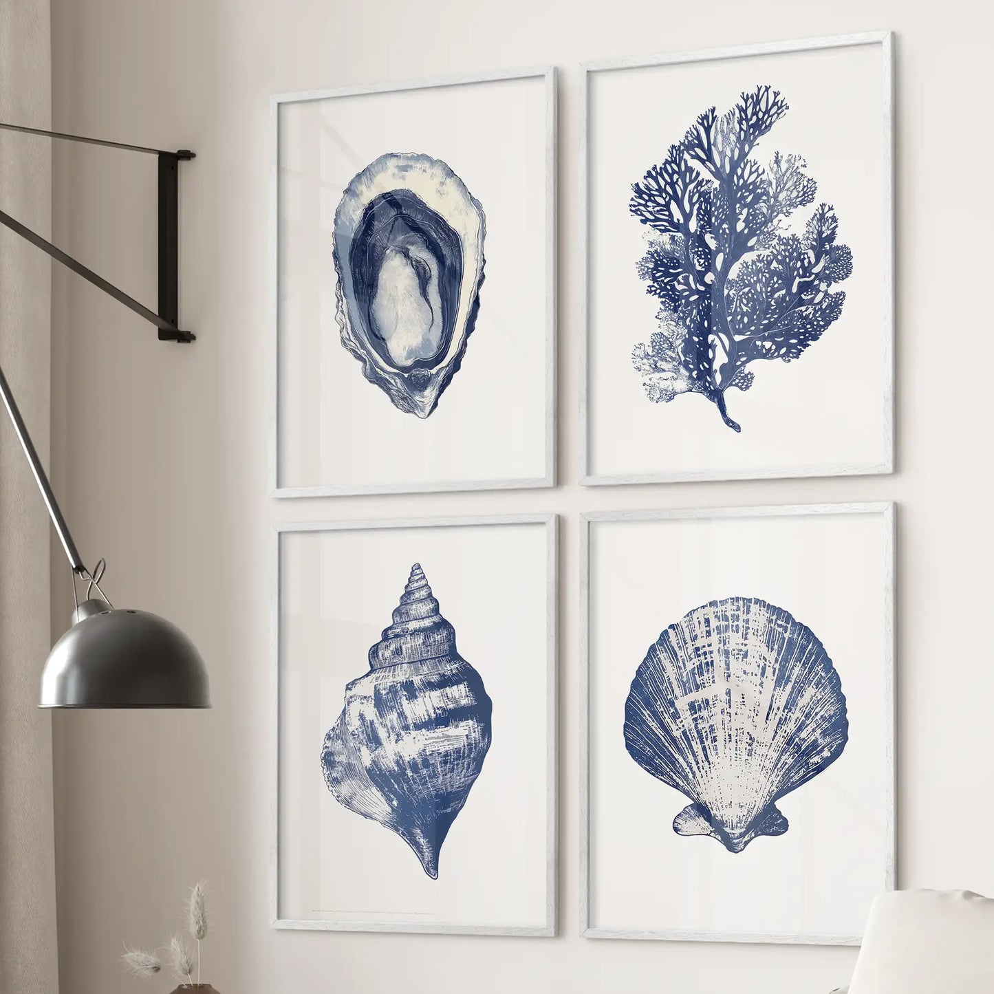 Set of 4 blue seashells and coral wall art. Ocean theme prints beach house decor. White frames for living room.