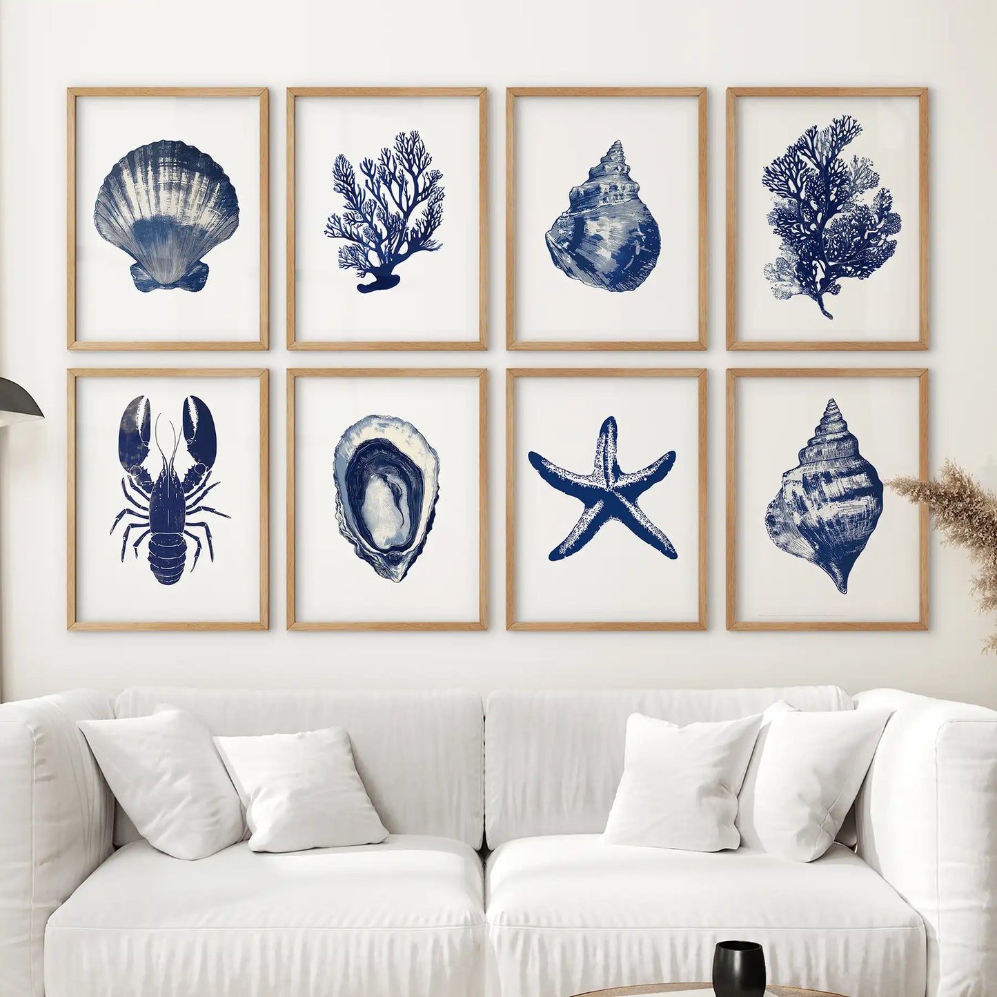 Seaweed, starfish, shell, lobster room decor. Modern watercolor marine set of 8 piece. Thinwood frames over the couch.