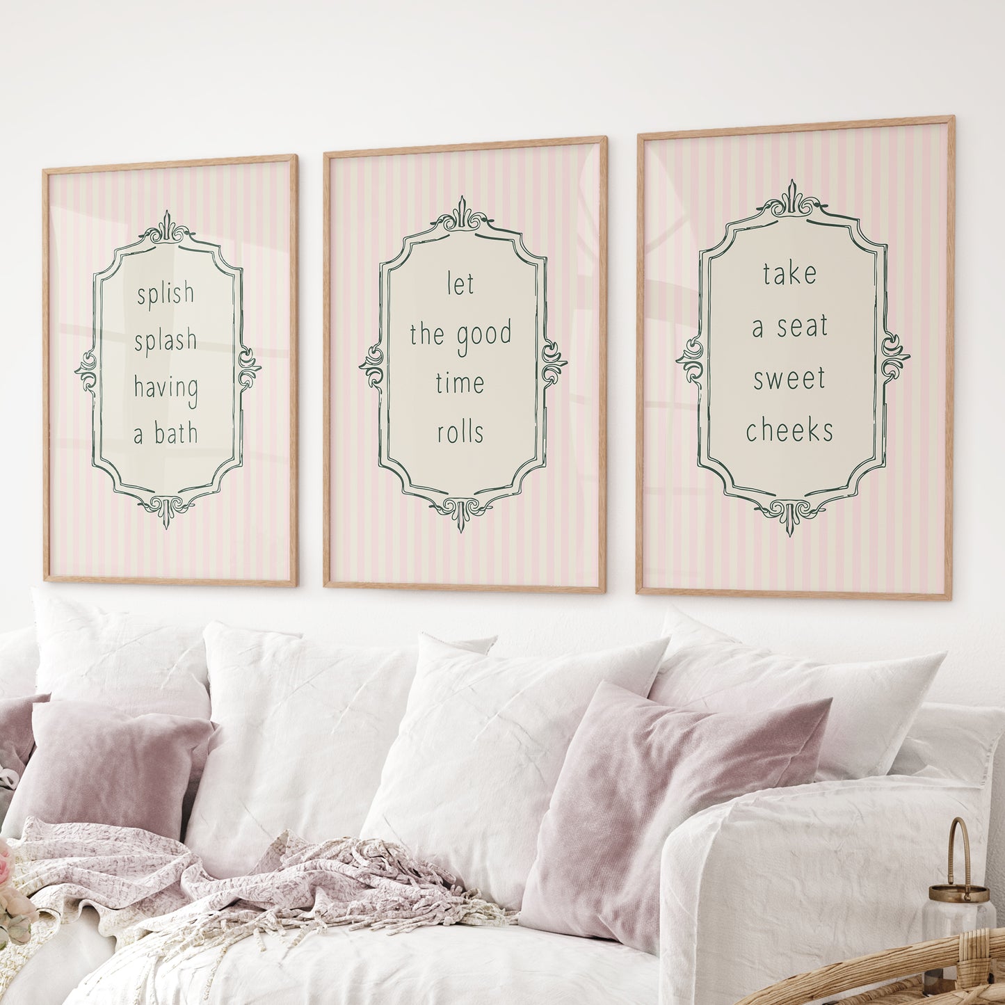 Typography bathroom prints with humorous sayings. Thinwood frames over the couch.