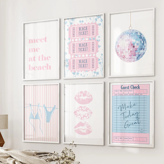 A six-piece wall art set in white frames reads “Meet Me at the Beach,” resting near the bed for an easy coastal look accented by lips and disco shimmer.