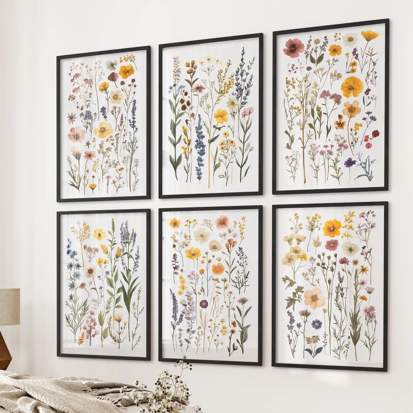 Modern floral wall decor with lavender, poppies, and wild blooms in a set of six vertical prints. Black frames for living room.