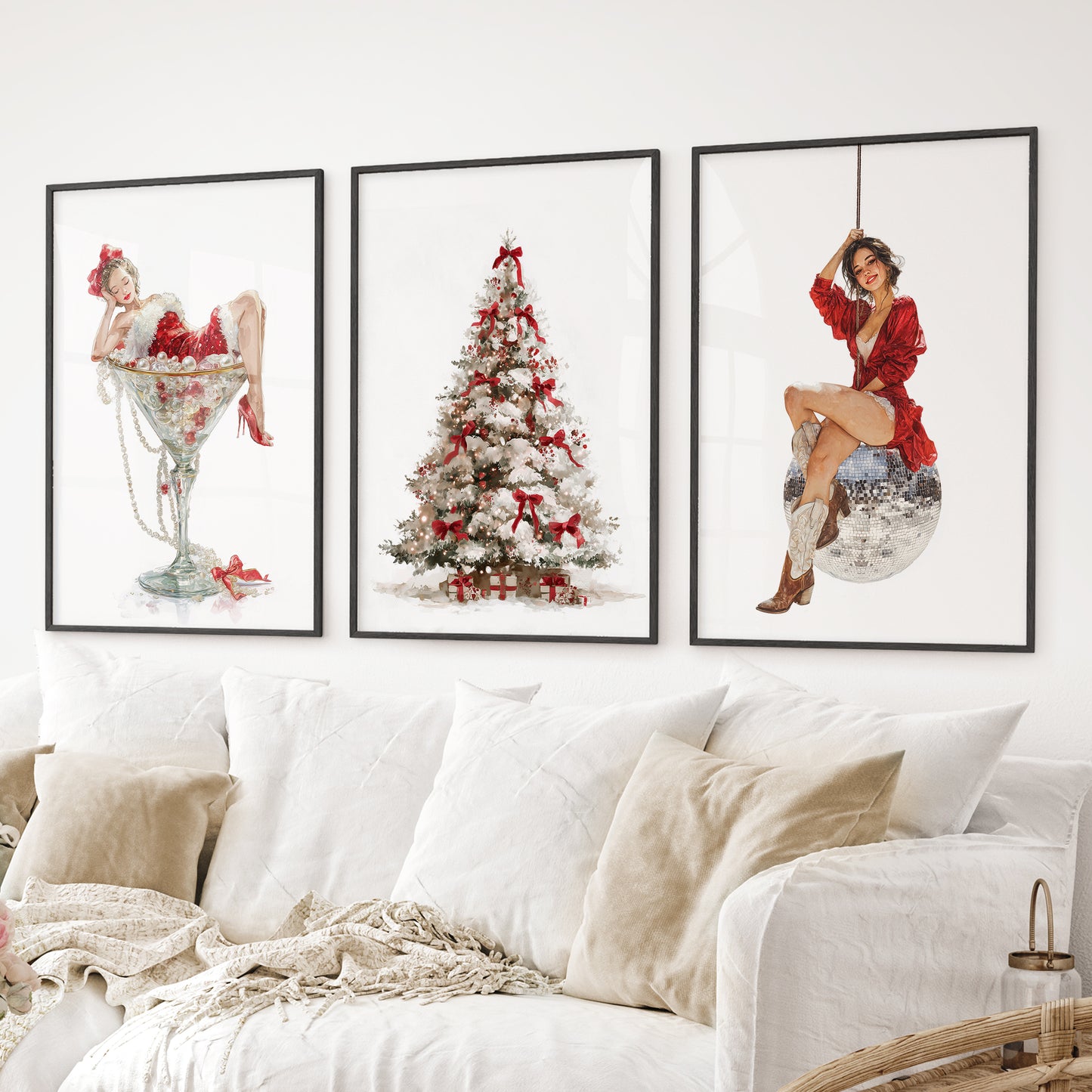 Festive holiday poster set – pin up inspired wall decor with Christmas theme. Black frames above the sofa.
