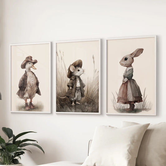 Vintage goose art prints, three-piece gallery wall in white frames, arranged over the lounge couch while rabbit and mouse complete the set.
