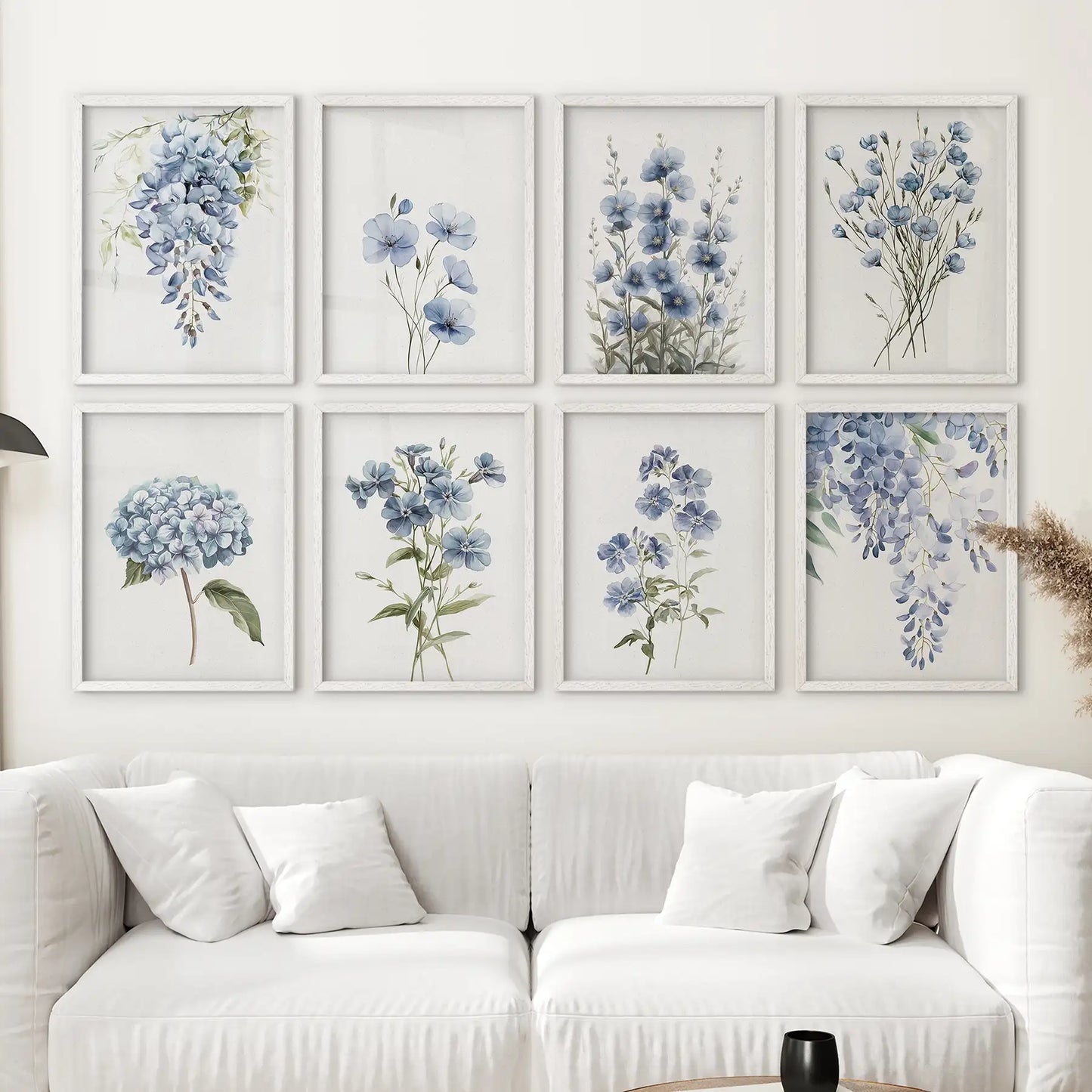 Delphinium flower print modern blue wall decor. Neutral living room art posters. White frames above the sofa.