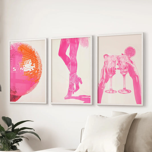 A set of three large disco ball posters in white frames gleams above the sectional, giving the family room a glossy, upbeat vibe.