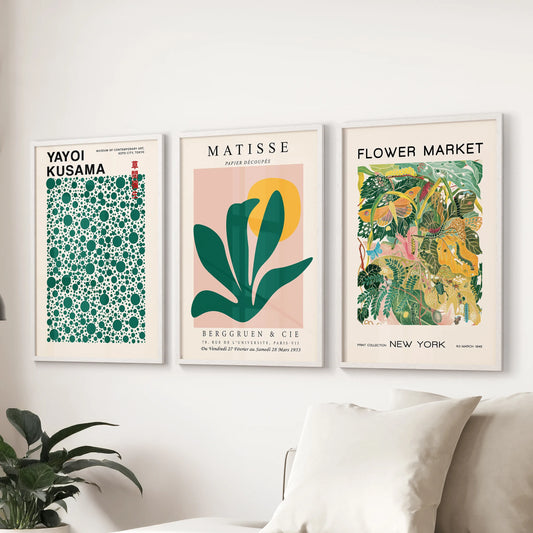 Green and yellow abstract shapes, three-piece wall art, white-framed in the sitting room behind the sofa for a lively, curated gallery feel.