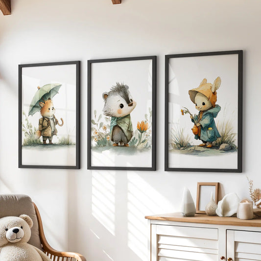 Fox, bunny, and hedgehog wall art three-piece set in slim black frames for a kids room, styled to sit above the dresser.