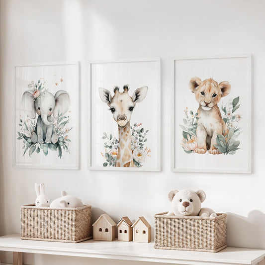 Three-piece wall decor set of baby jungle animals in bright white frames, adding cheerful style to the playroom just above the toy organizer.