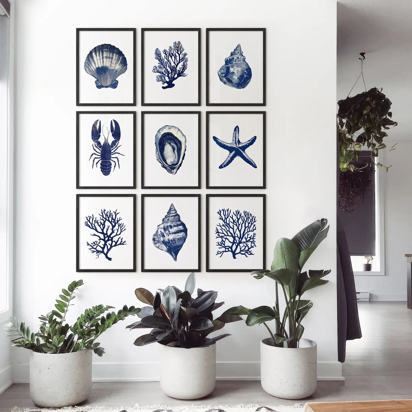 Navy blue coral seaweed wall art set of 9 piece. Beach house artwork decor. Black frames for bedroom.