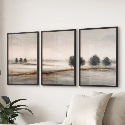Set of three Nordic artwork prints in slim black frames sits behind the sofa, bringing quiet texture and ease to the family room.