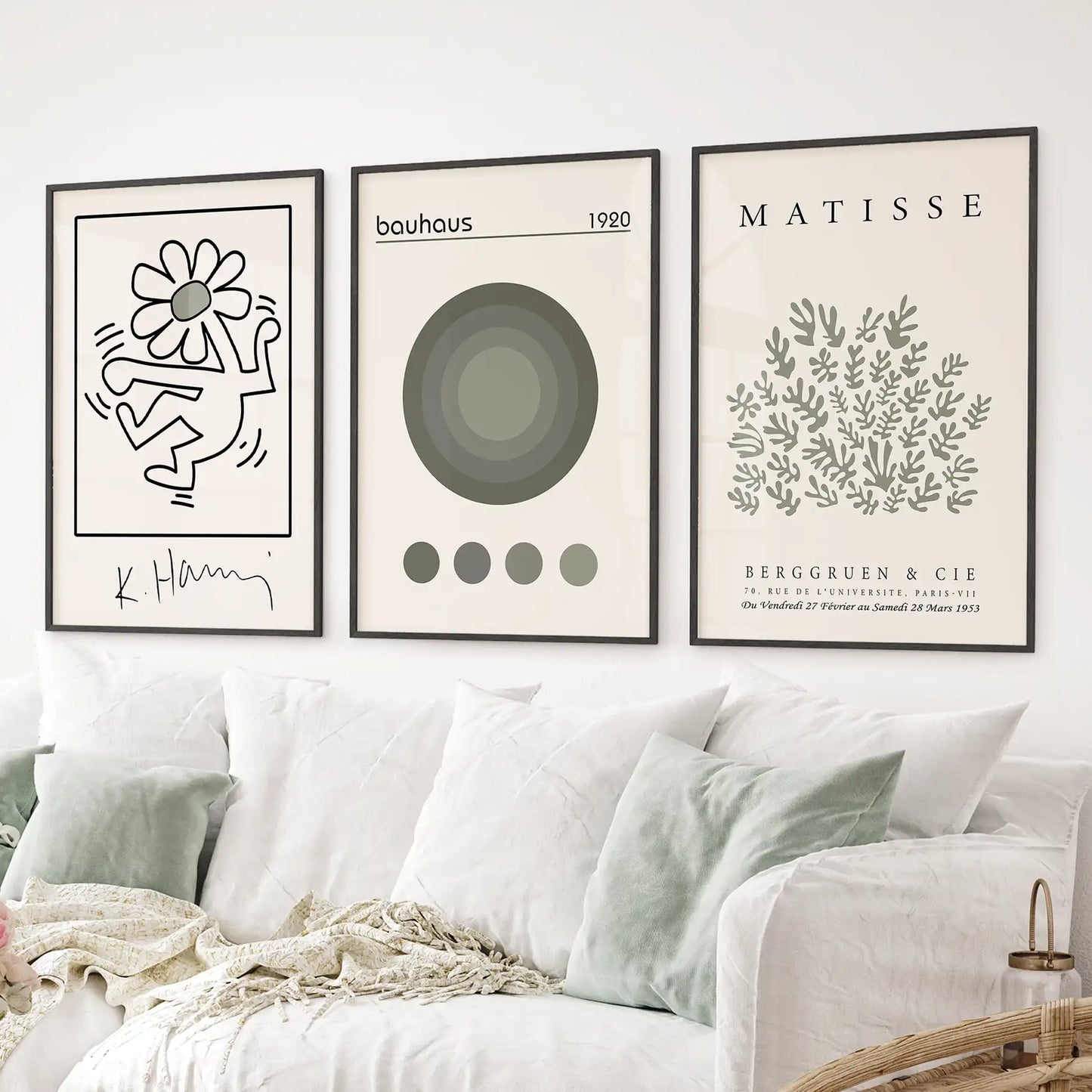 Neutral wall art poster set of 3. Keith Haring flower print. Black frames over the couch.