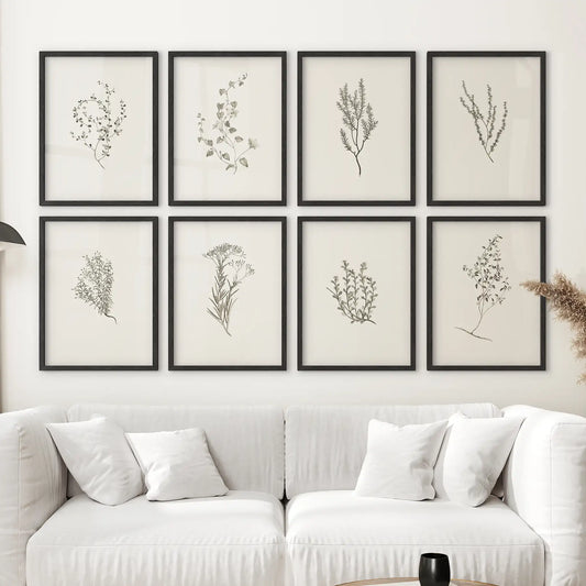 Gallery wall with 8 botanical prints featuring wildflowers and herbs. Rustic scandinavian wall art. Black frames for living room.