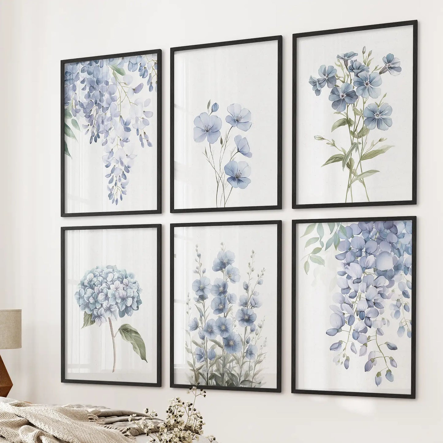 Modern gallery wall with six poster blue botanical illustrations. Watercolor art decor. Black frames for bedroom.
