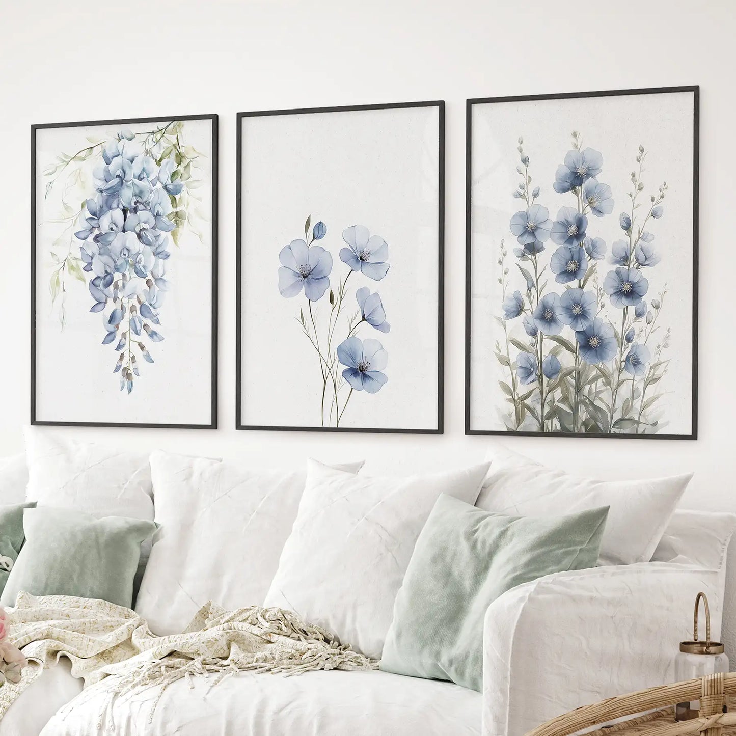 Blue floral watercolor wall art set of 3 prints with wisteria, poppy-like flowers, and delphinium. Black frames for living room.