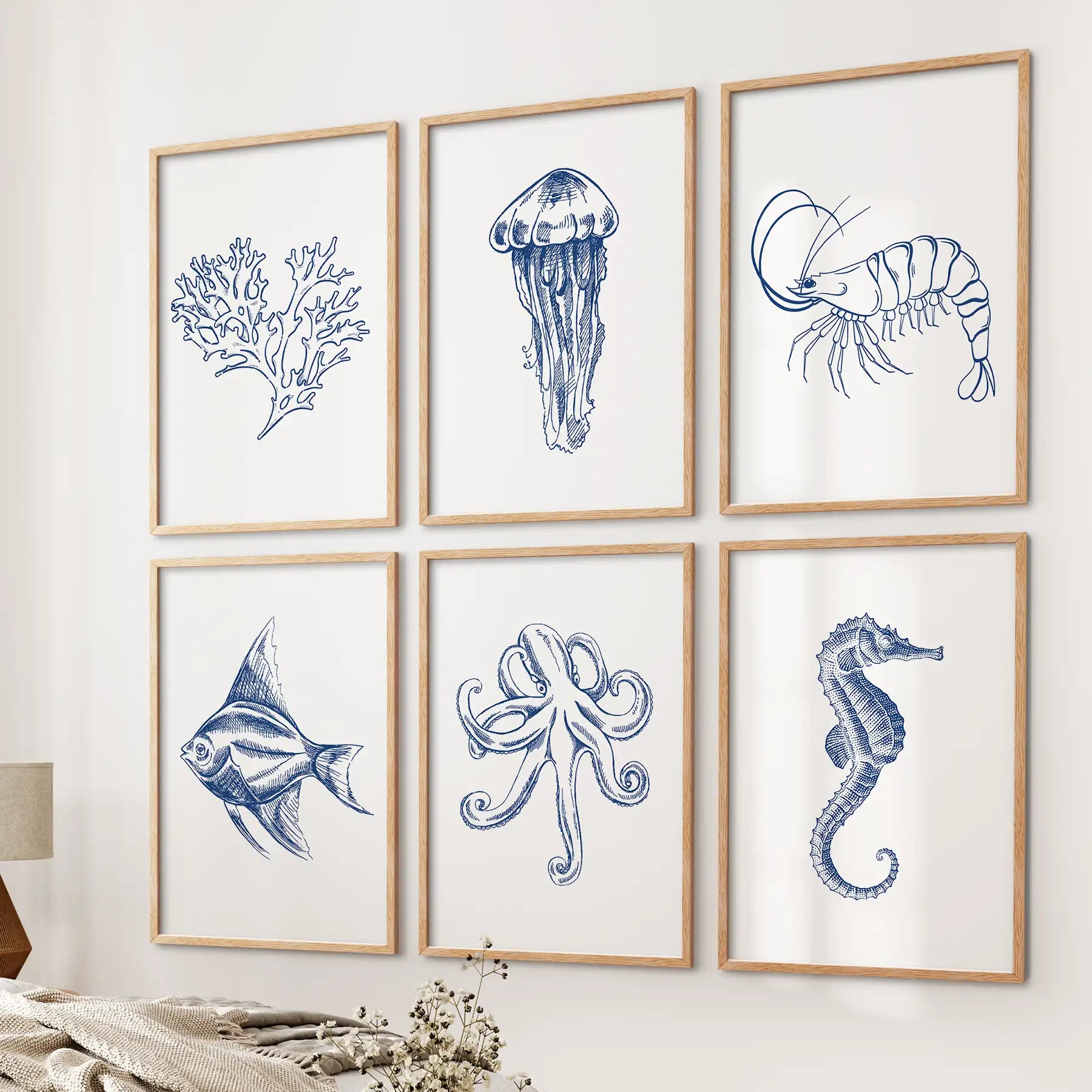 Sealife poster coastal wall decor. Blue sea animals home decor. Wood frames over the bed.