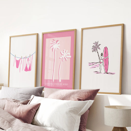 Light pink swimsuits three piece artwork with a light oak frame softens a pink bedroom, aligned over the bed headboard as relaxed beach wall art.