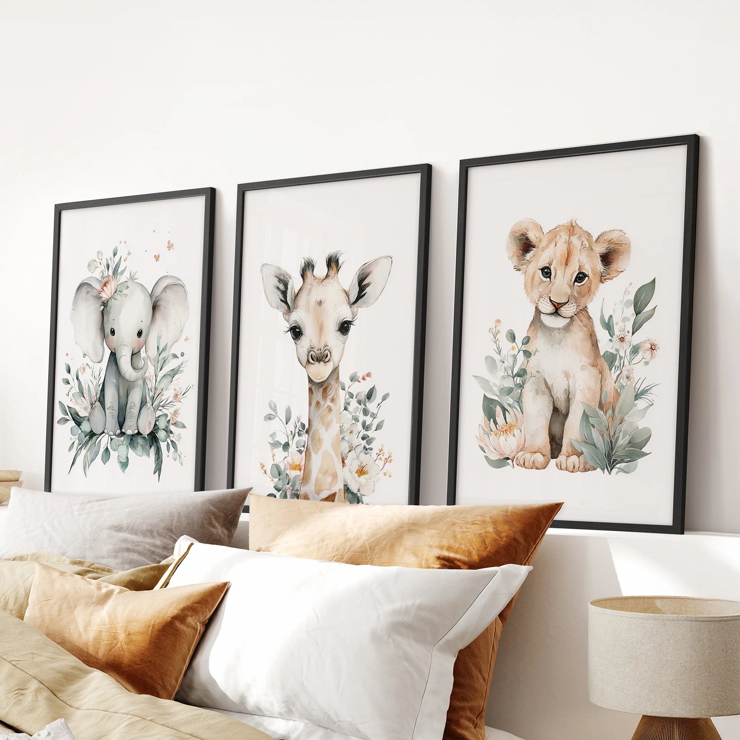 Safari animals wall art in a 3-piece set, black-framed to anchor the bedroom and sized to hang neatly over the headboard.