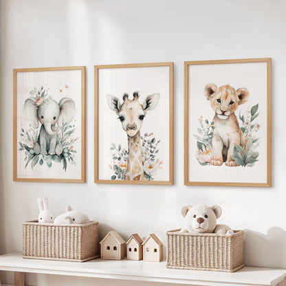 Set of three safari animal wall prints in warm natural wood frames, a cozy touch for the kids playroom displayed over the toy storage bench.