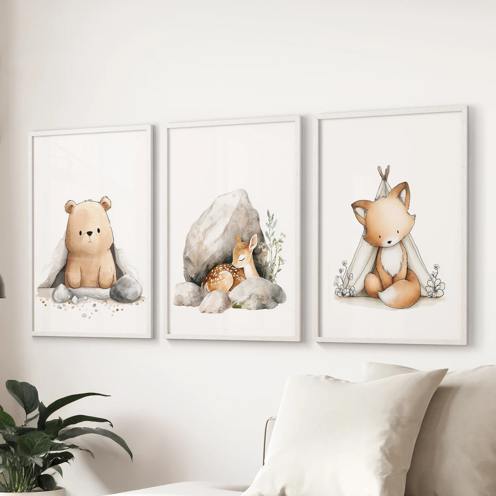 Woodland animals, a set of three art prints in white frames, stretch a friendly gallery over the sectional sofa in the sitting room.
