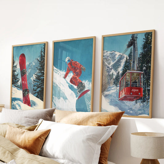 Apres-ski culture prints, a 3-piece art set in natural oak frames, settle above the bedroom headboard with cozy lodge notes and nostalgic type.