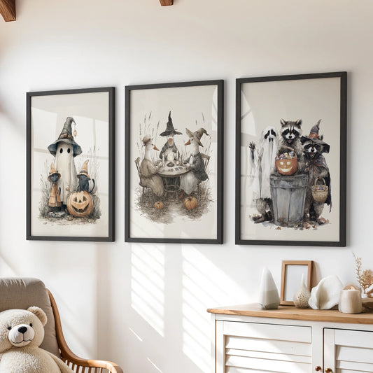 Playful ghost poster set of 3 in black frames brightens a kids playroom, hanging above the chest of drawers for a cheerful seasonal accent.