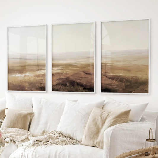 Calm minimalist landscape wall decor set of 3 neutral toned prints. White frames for living room.