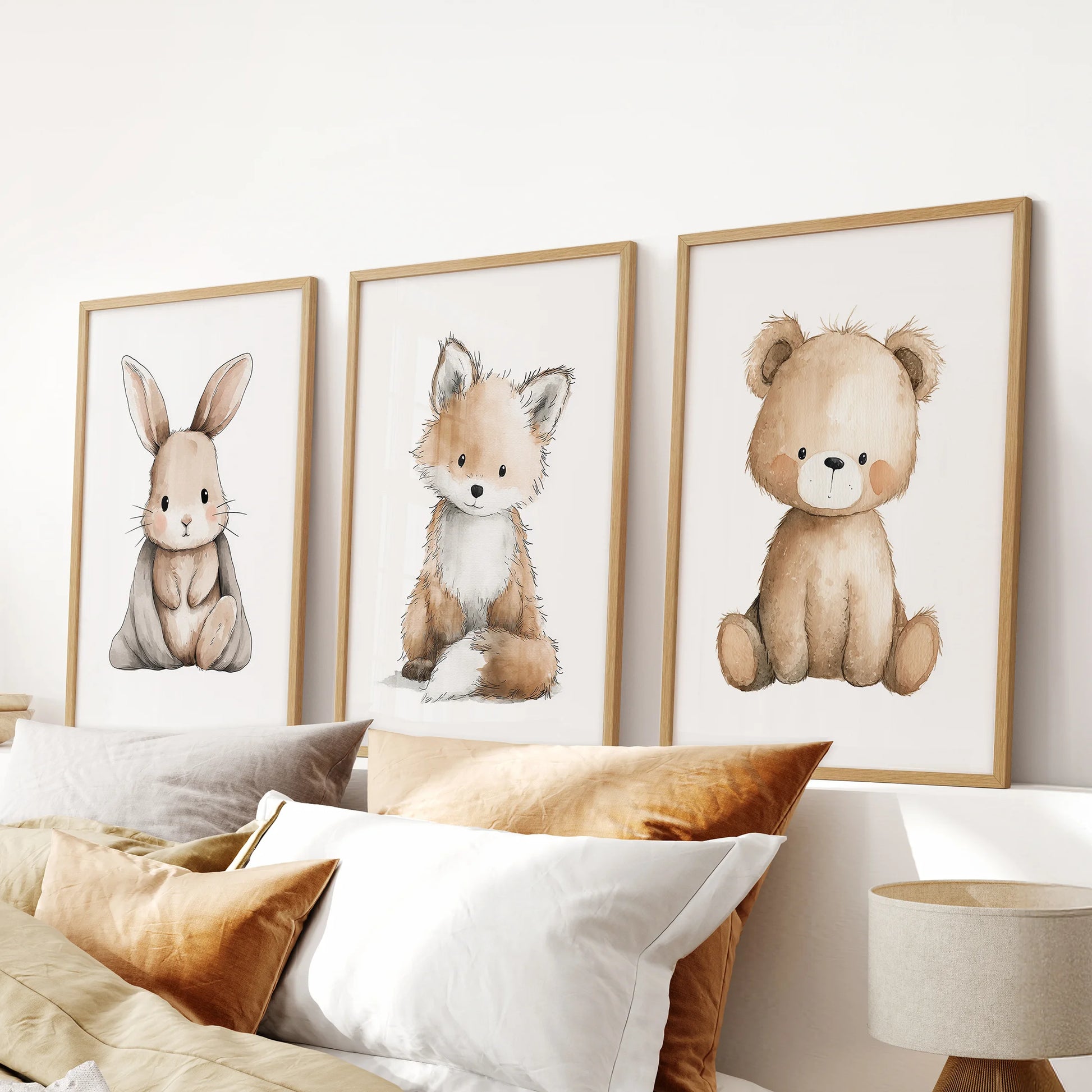 Forest friends 3-piece wall art anchors the space over the bed in a bedroom, framed in warm wood for a timeless, kid-friendly look.