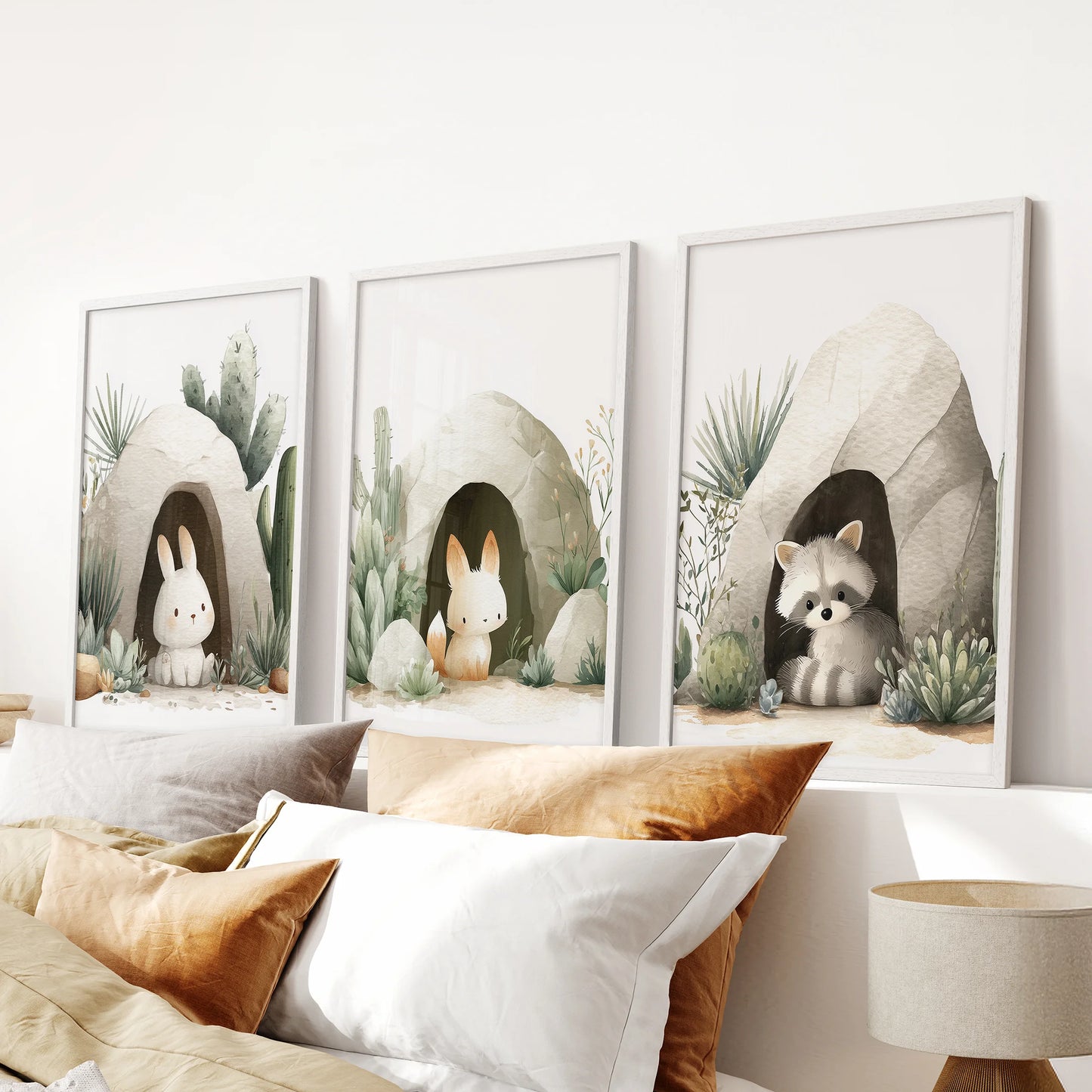 Minimal watercolor animals—two rabbits and a raccoon—surrounded by desert greenery.