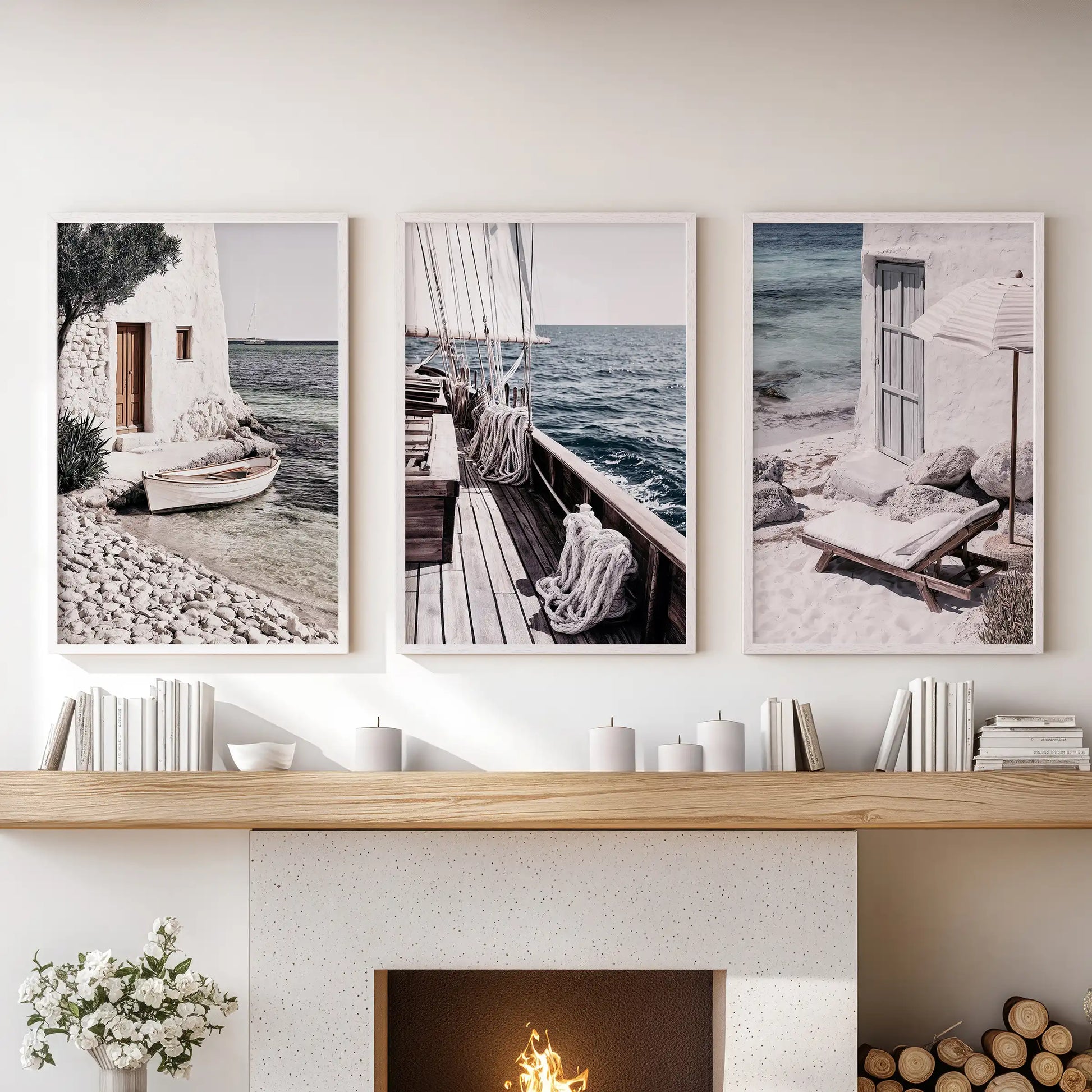 Wall art with luxury yachts is presented as a trio in white-framed prints, arranged over the mantelpiece to add sleek nautical elegance to the sitting room.