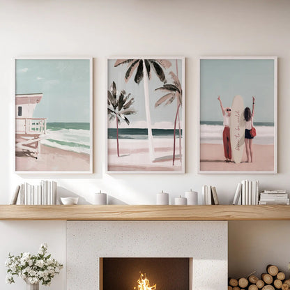 An art set of three shoreline prints in simple white frames hangs over the hearth, brightening the living room with soft sea light.