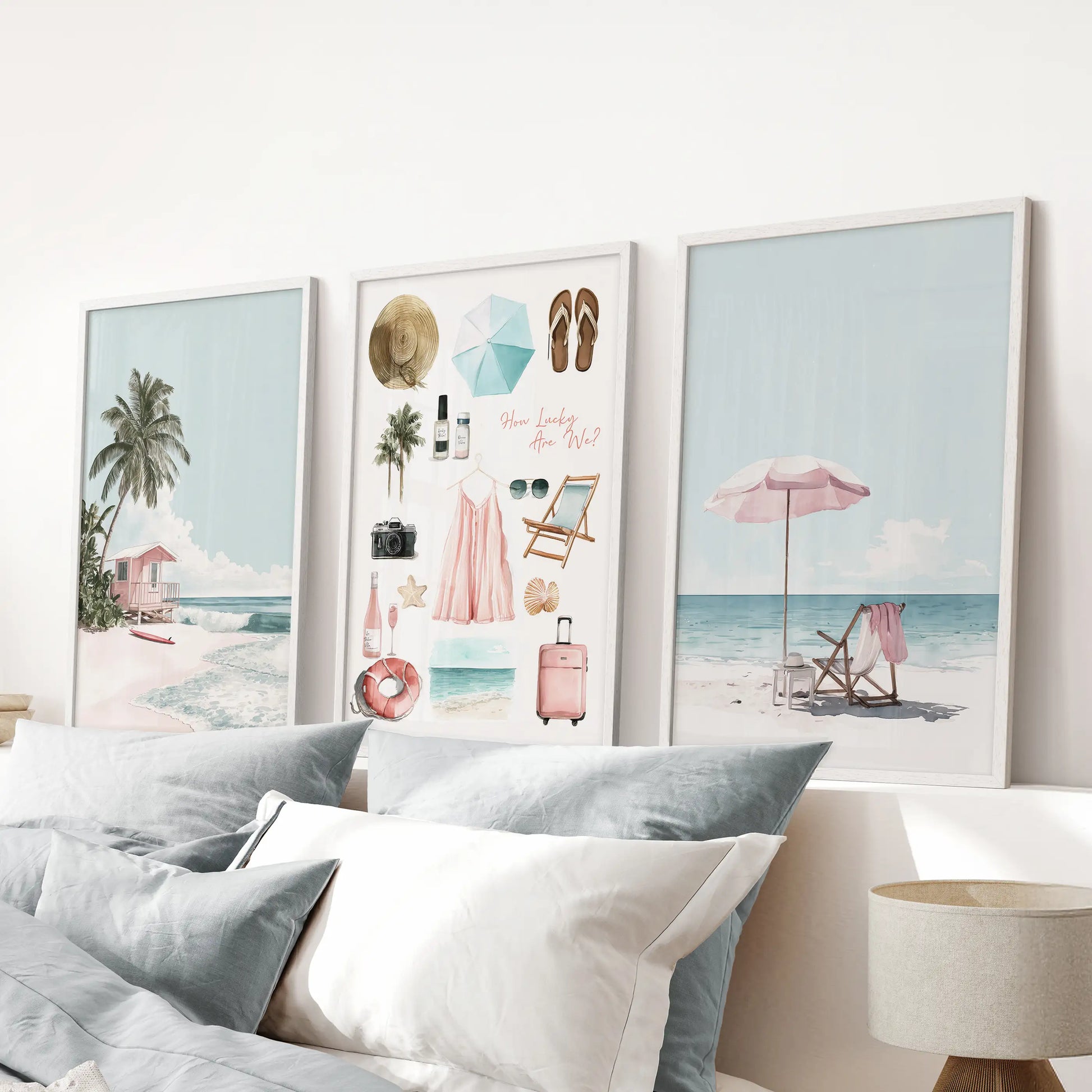 Coral and sea botanicals rendered as a three-piece wall decor set in white-framed prints soften a blue bedroom, resting neatly above the headboard.