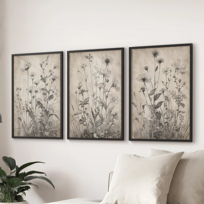 Rustic farmhouse blooms, a wall art 3-piece set with black frames, ground the family room and look tailored above the couch.