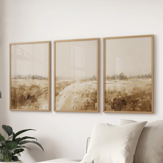 Earth-tone abstract horizon artwork, a 3-print set in oak frames, balances the lounge space beautifully above the sofa.