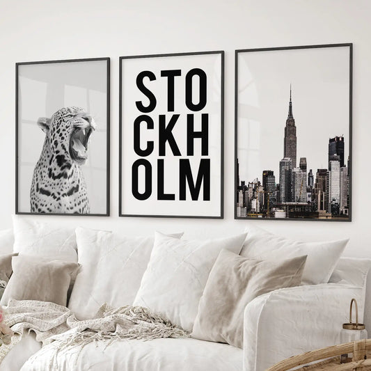New York city skyline wall art print. Set of 3 modern city wall prints. Black frames over the couch.