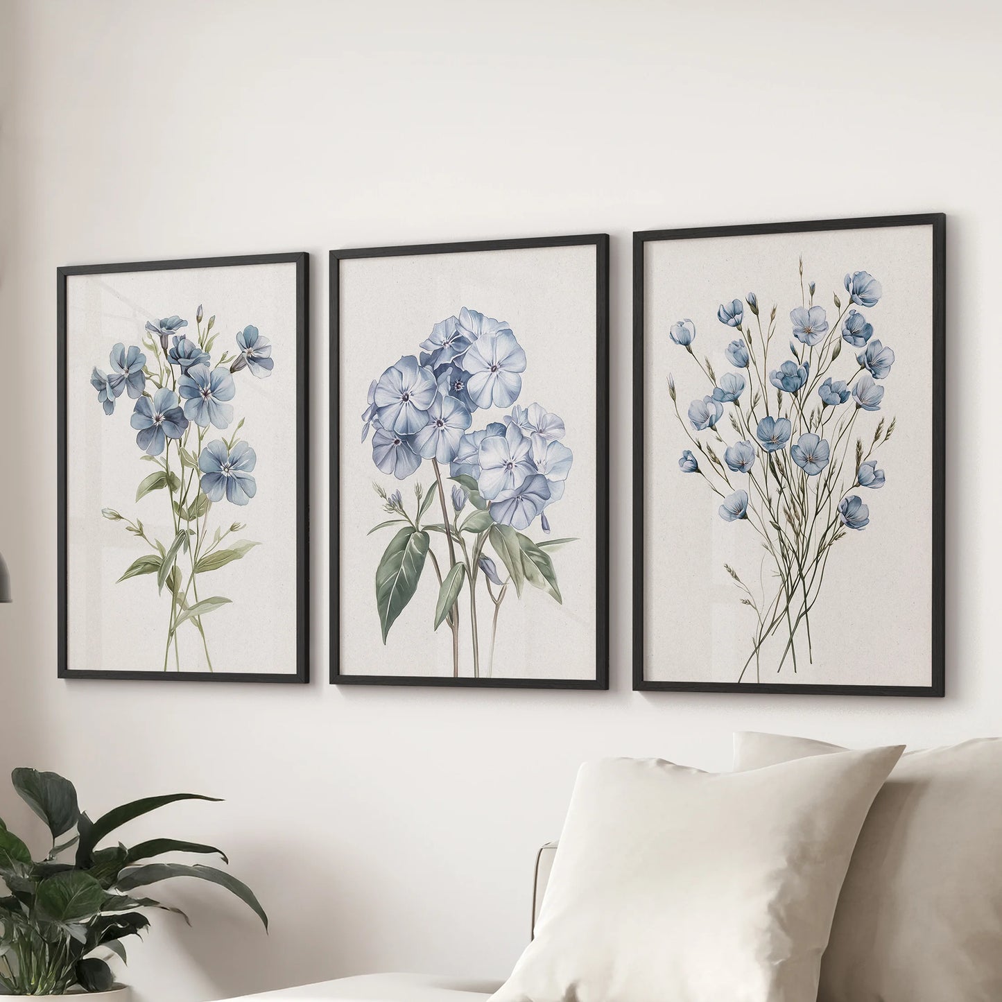 Hydrangea flower decor , a three-poster wall art set in black frames, anchors the space over the sectional sofa in the family room.