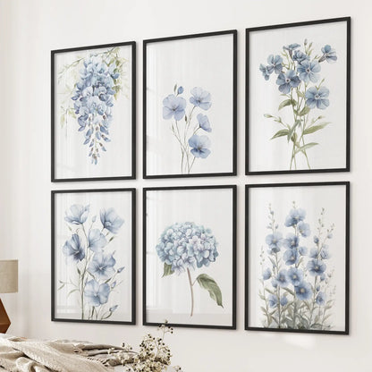 Blue watercolor floral wall art set of 6 prints featuring hydrangeas, wildflowers, and leaves. Black frames over the bed.