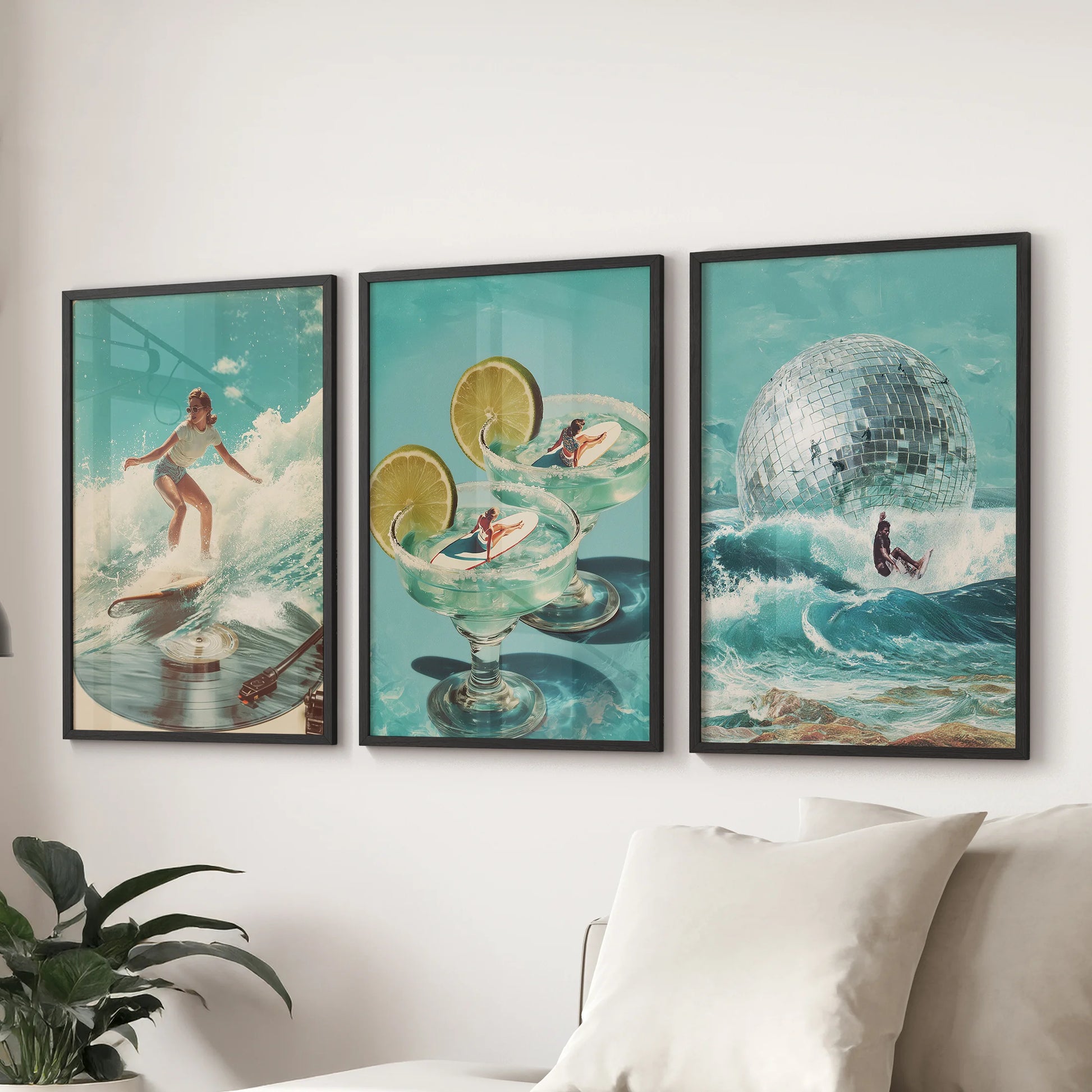 Three black-framed prints of blue ocean waves sweep across the lounge wall behind the couch, adding a cool coastal rhythm to the space.