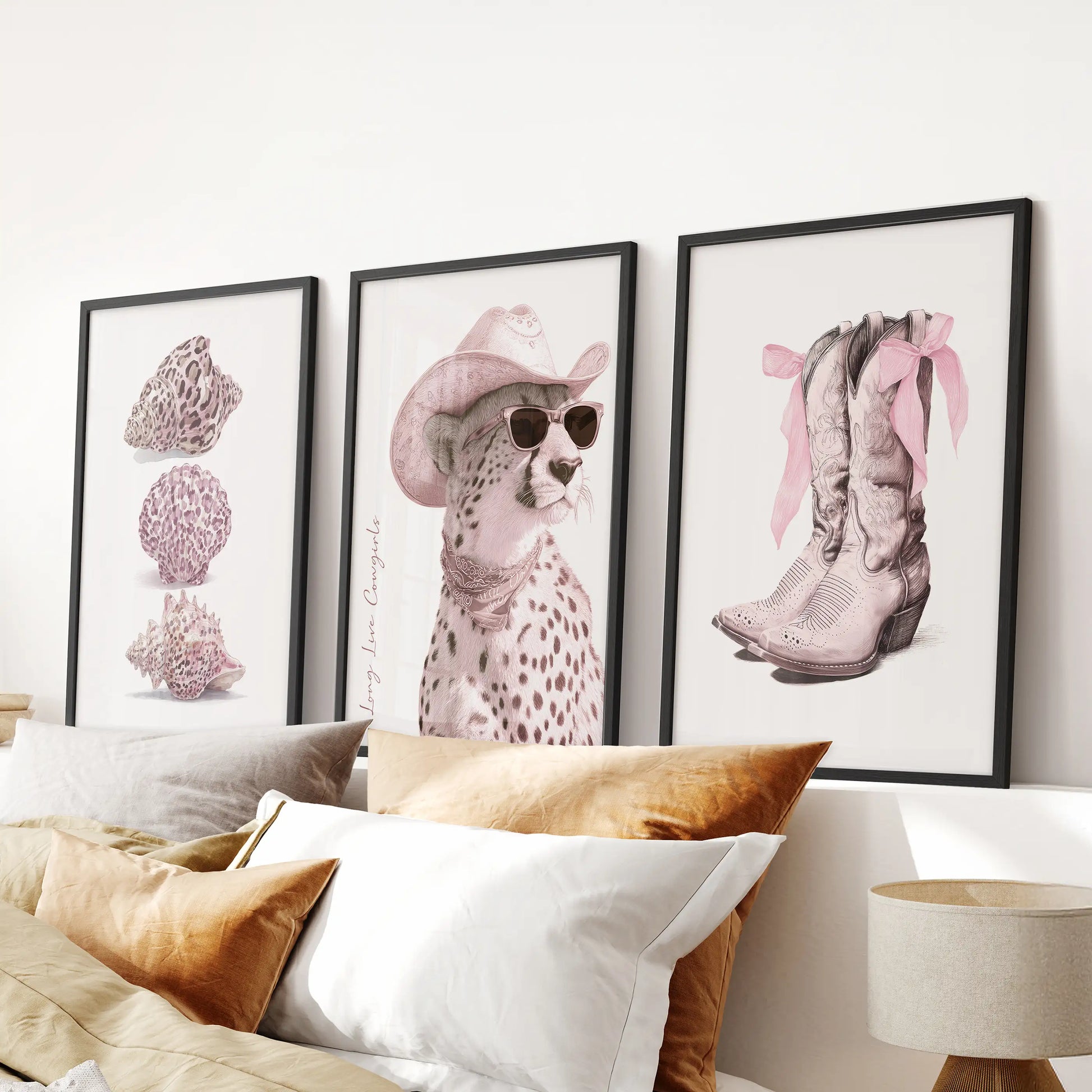 A trio of cowgirl boots and bows prints in sleek black frames crowns the bed, bringing playful Western flair to the bedroom decor.