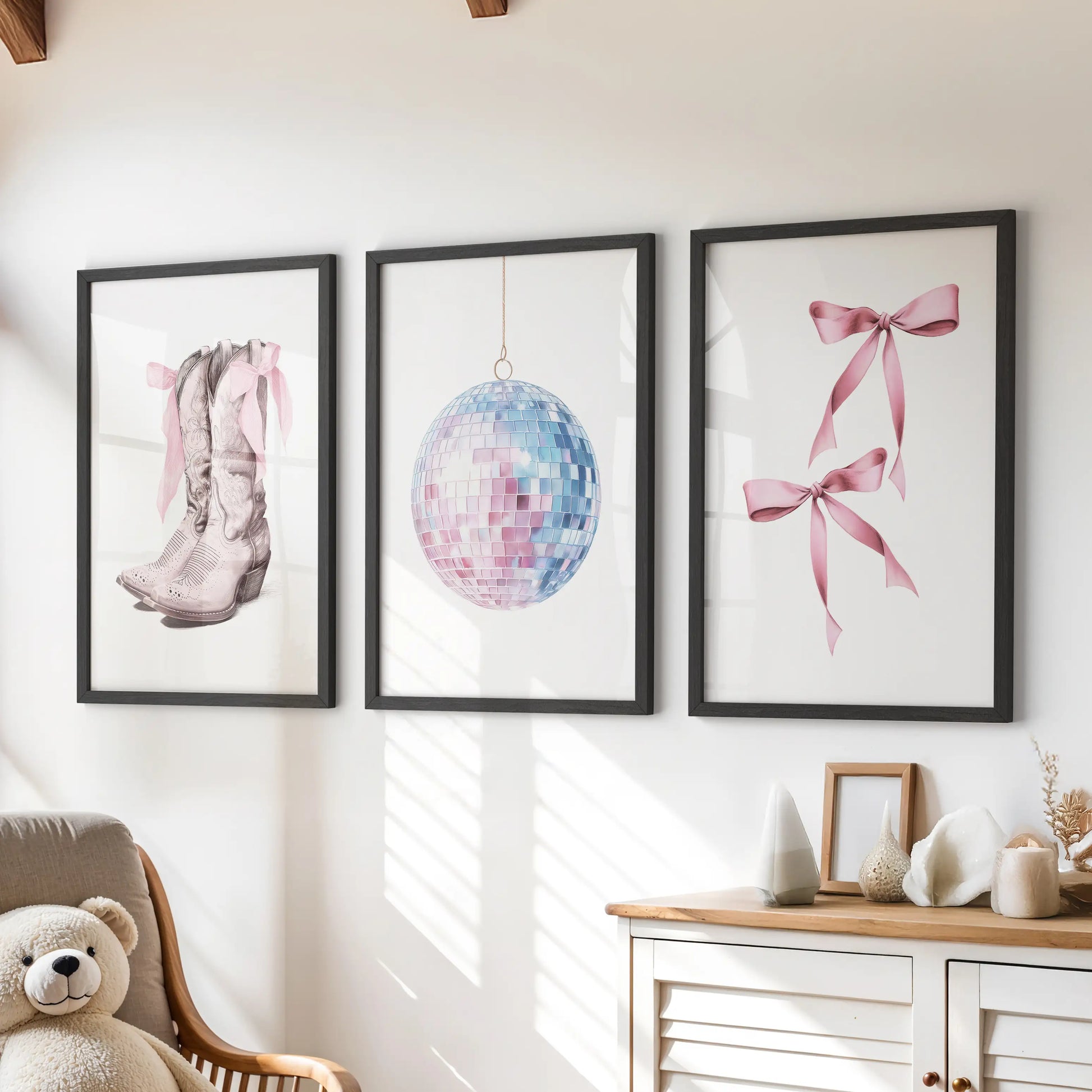 This three-piece bow-themed wall art set, framed in black, perches above the kids’ dresser adding a playful coquette touch in pink and blue.