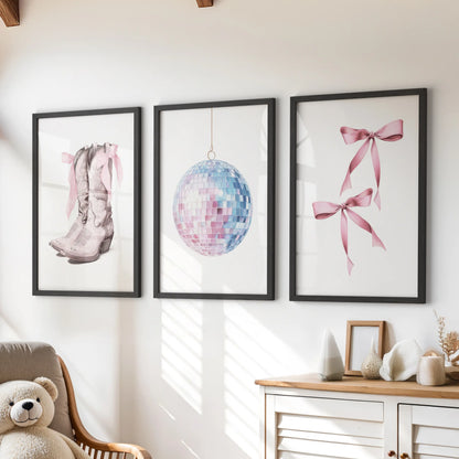 This three-piece bow-themed wall art set, framed in black, perches above the kids’ dresser adding a playful coquette touch in pink and blue.
