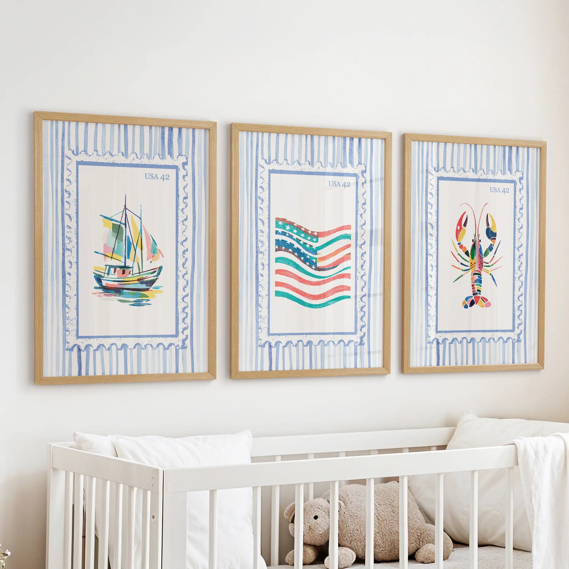 This wall-hanging trio of bright coastal prints, framed in warm oak, rests above the crib to soften the baby’s room with coastal color.