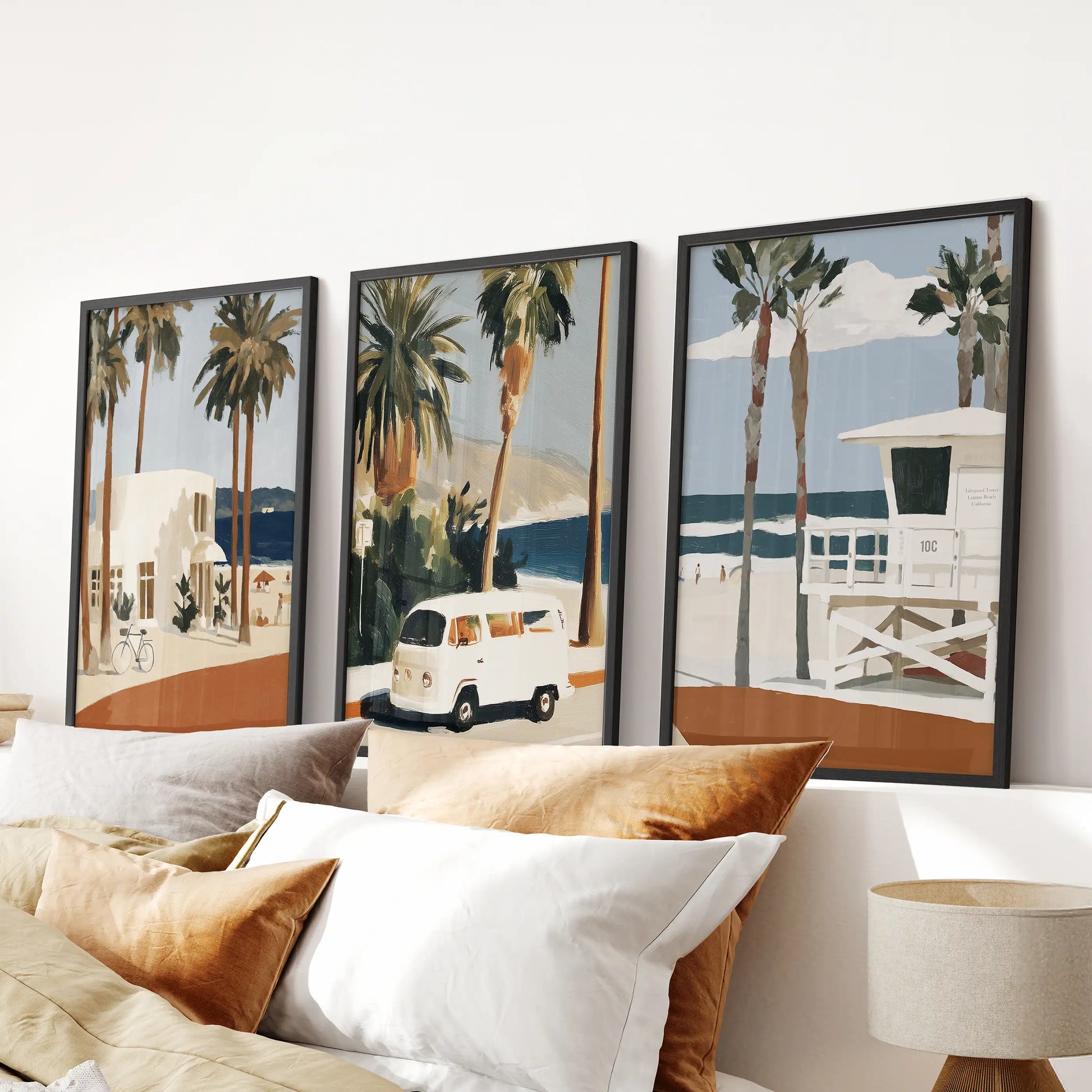 Vintage surf van wall art, set of 3 large prints, in black frames for a bedroom, placed over the headboard.