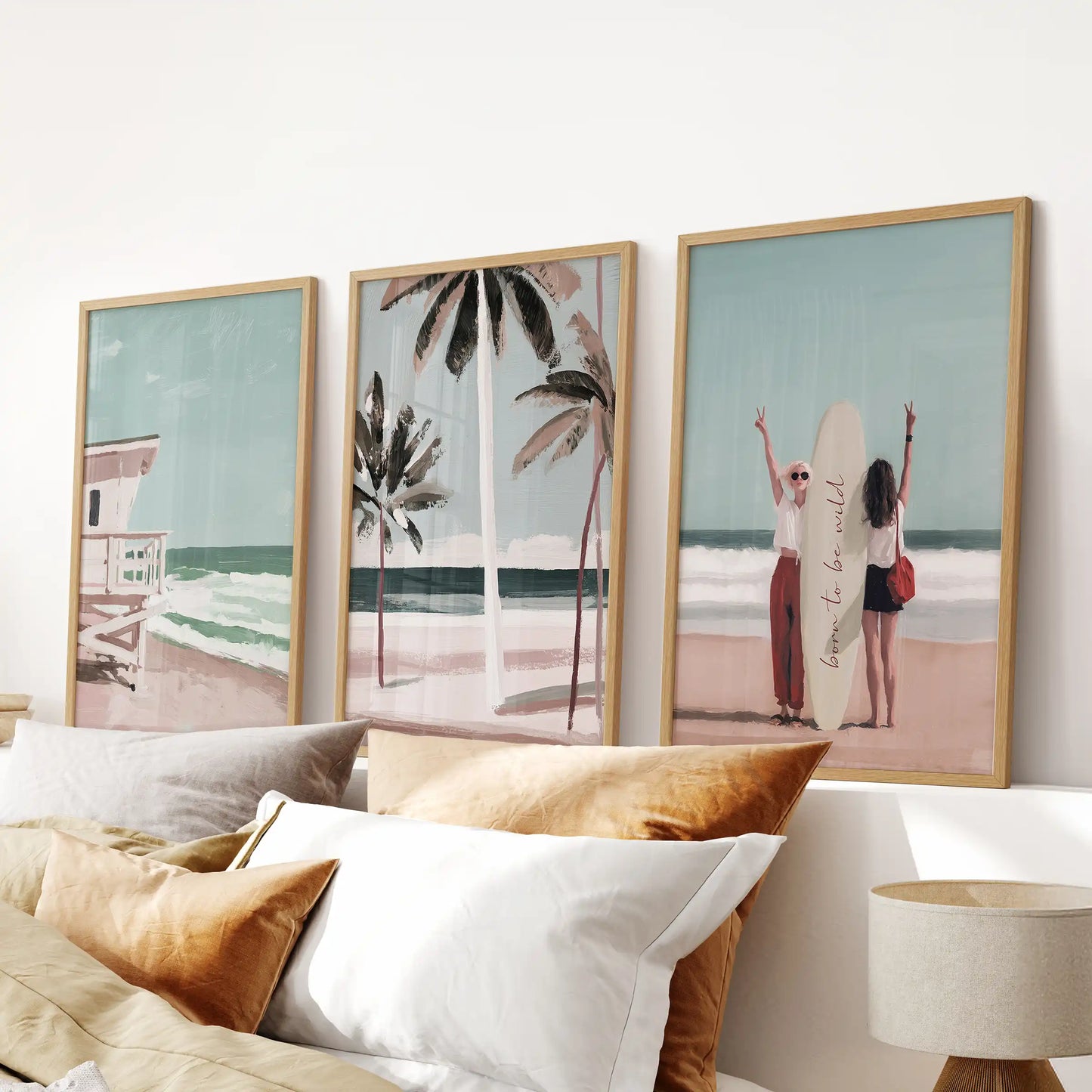 A solid-oak 3-piece picture set of California lifeguard towers hangs above the bed, giving the bedroom a bright, coastal focal point.