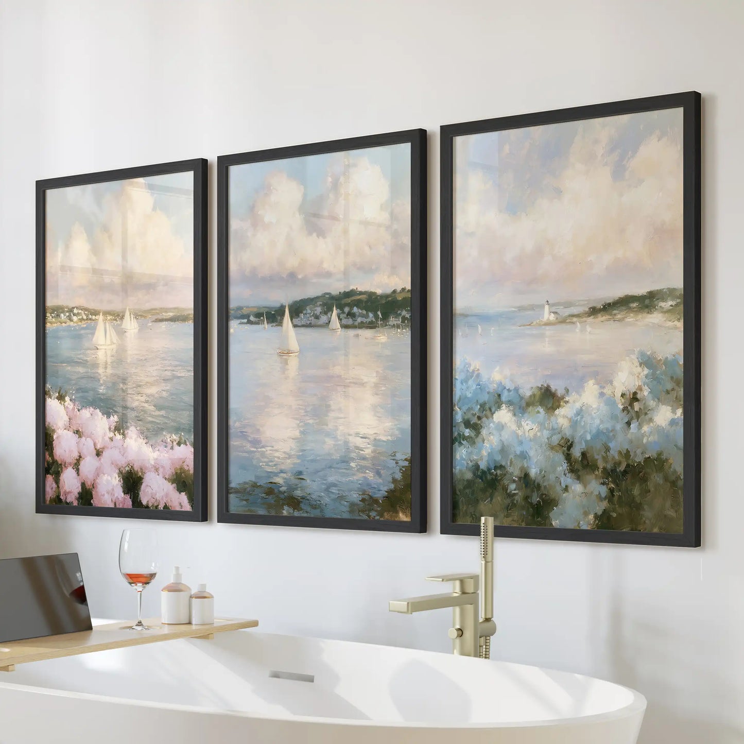 Framed wall art featuring a 3-piece Cape Cod shoreline set hangs above the bathroom bathtub. Black frames highlight dunes and surf in a crisp coastal scene.