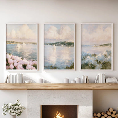 This 3-piece wall art featuring a New England coastal cottage rests above the family room mantel. White frames echo porch rails, dunes, and a salt-tinged breeze.