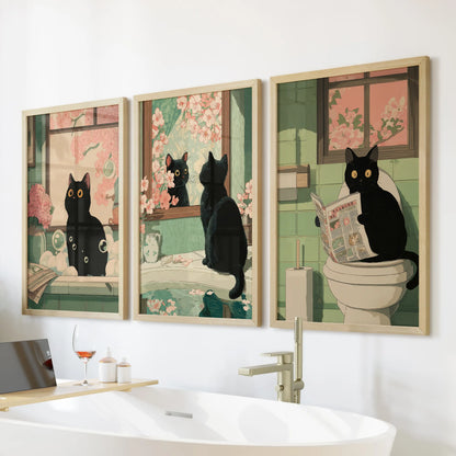 Maximalist Japanese cat illustration, a gallery of three in natural oak frames, brings playful bathroom wall art over the bathtub.