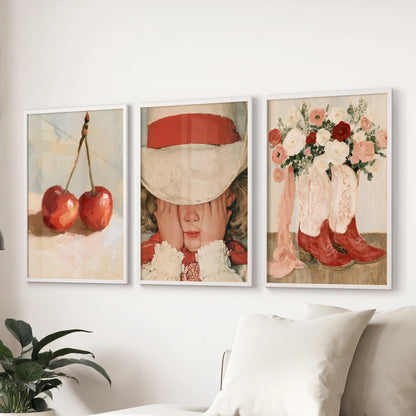 Vintage floral botanicals 3 piece artwork brings a design-forward note to the sitting room, hung over the sectional in slim white frames.