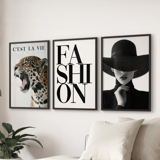 Stockholm-style fashion wall art, a three-print bundle in black frames, displayed behind the couch to elevate a relaxed lounge.